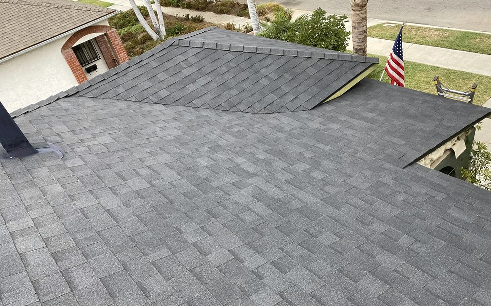 Completed architectural shingle installation documented by Sky Shield Roofing